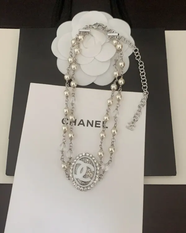 Chanel Double-Strand Pearl And CC Logo Necklace