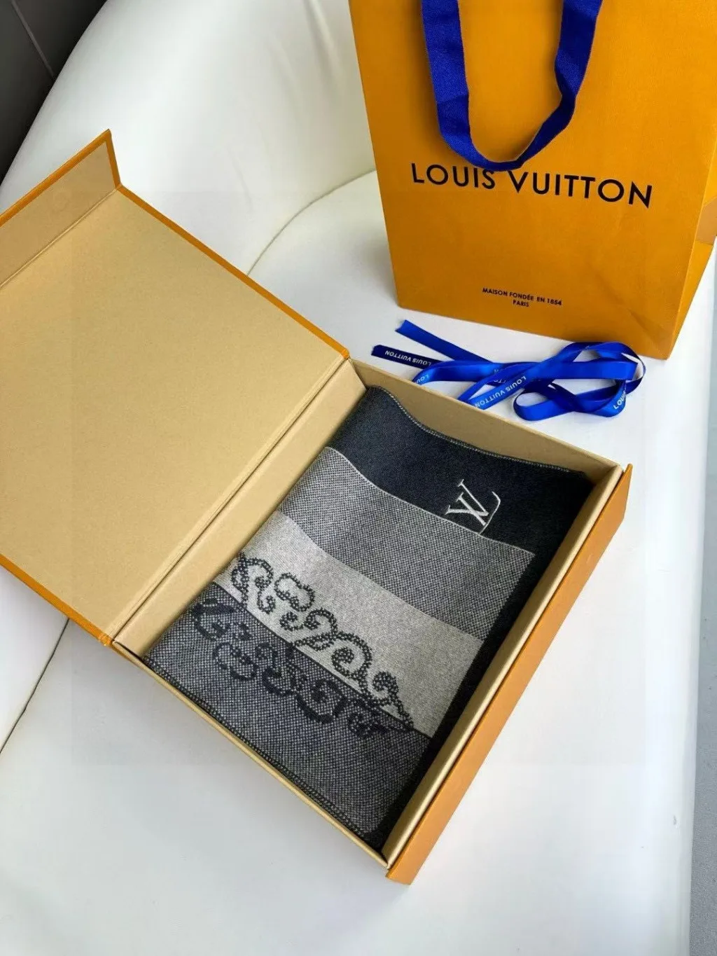 Louis Vuitton Monogram Classic or LV Essential scarf