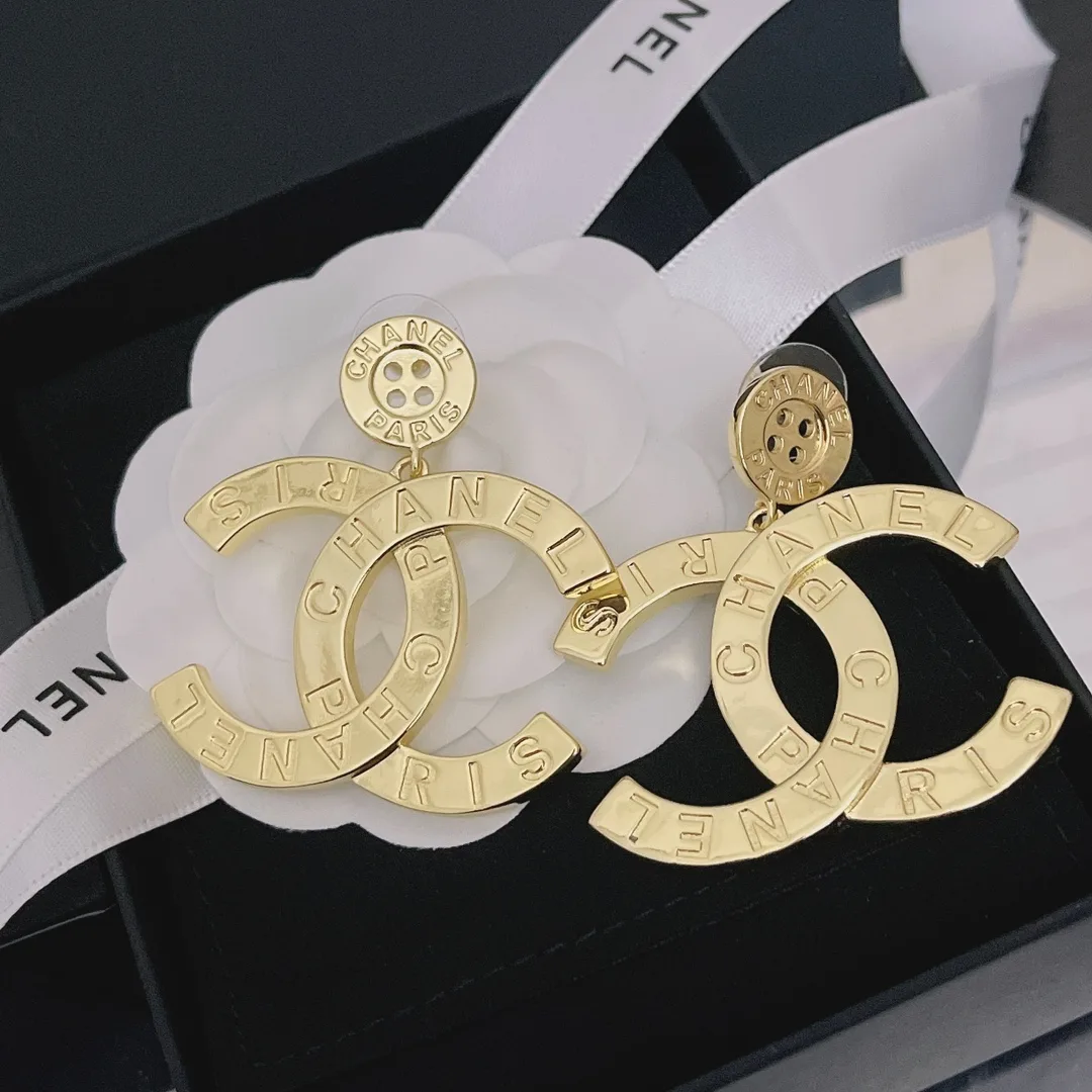 Chanel Paris Button Earrings Secondary image