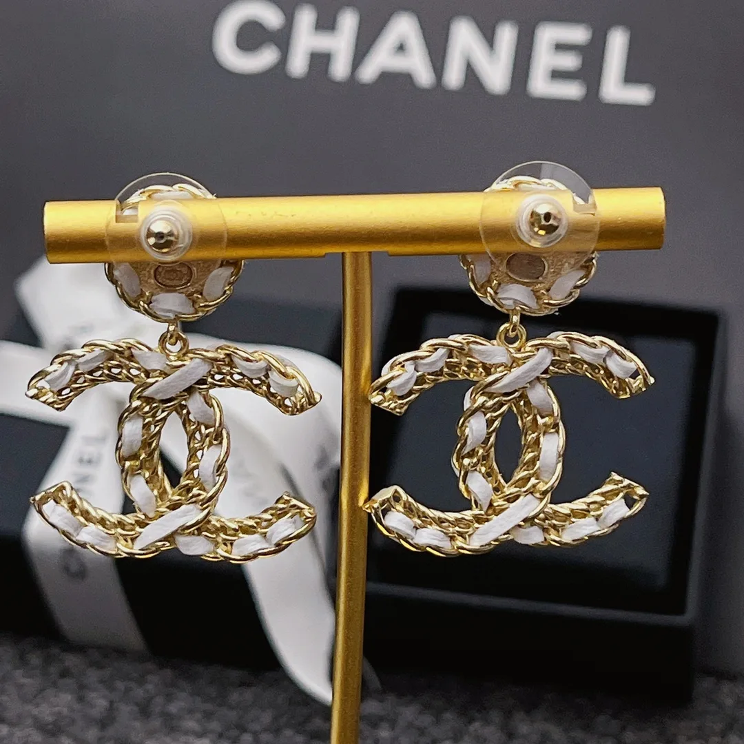 Chanel White Leather And Gold Metal Earrings Secondary image